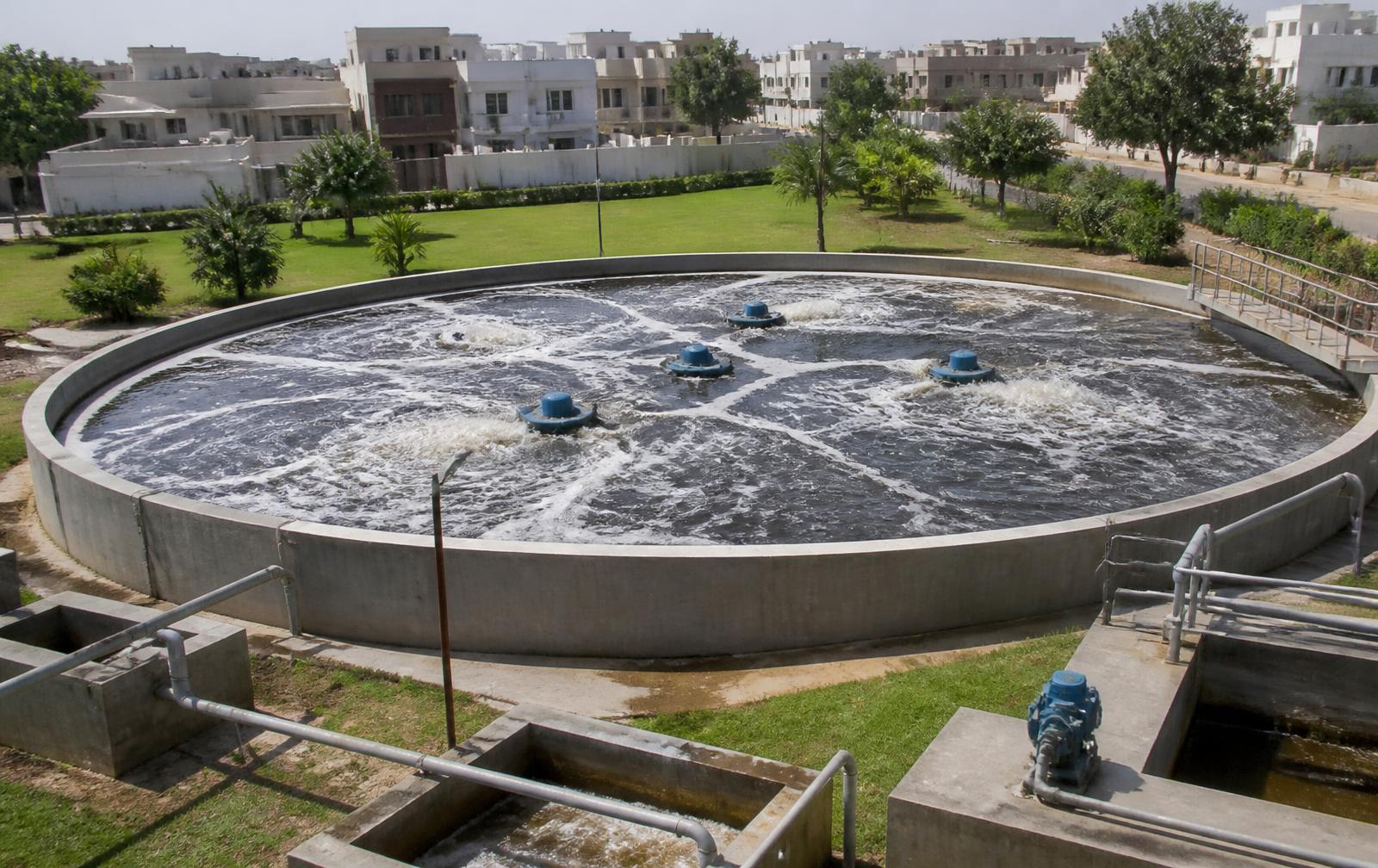 Treatment plant with penstocks and weir gates